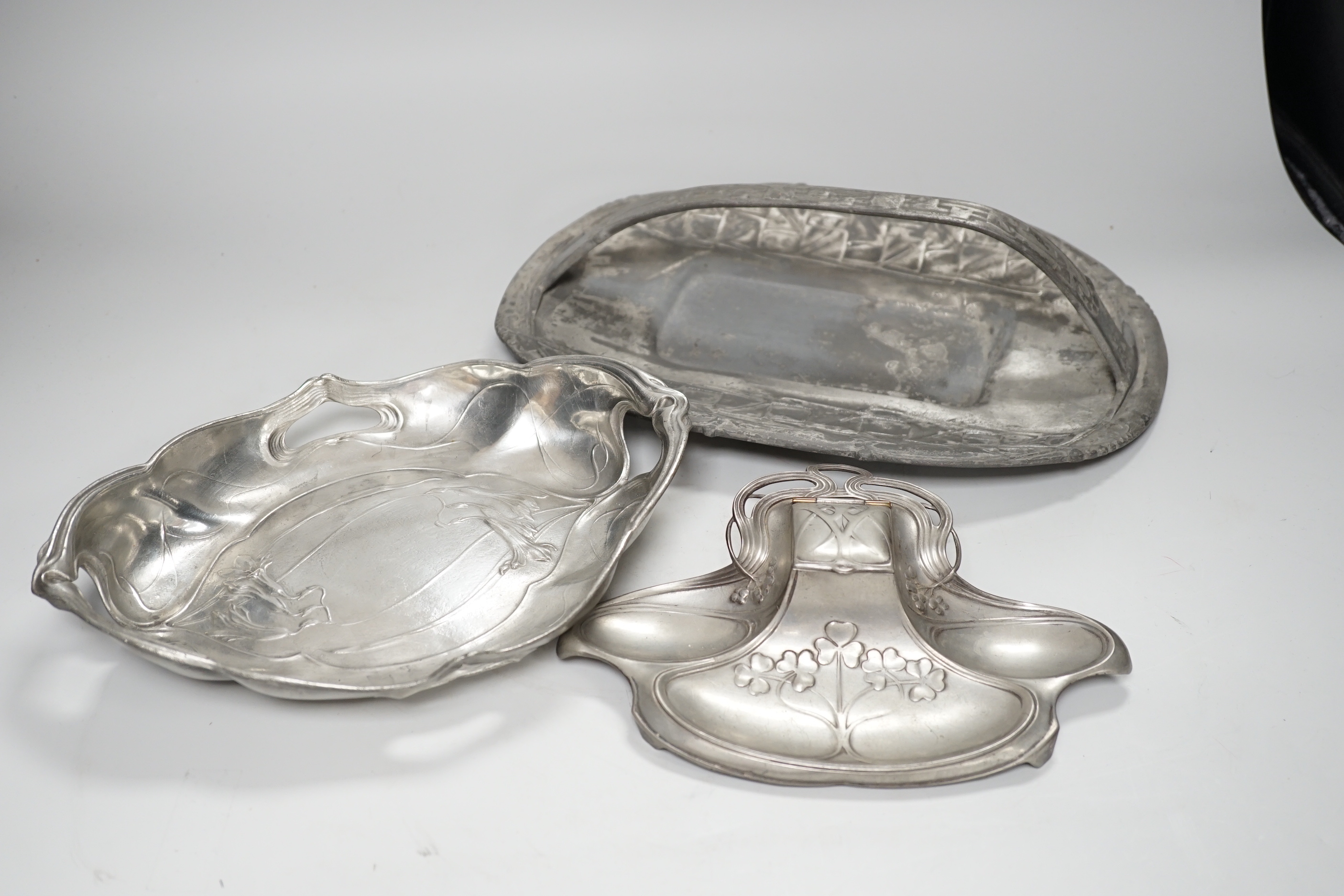 Three pieces Art Nouveau pewter - a WMF inkwell, Tudric handled tray and another piece